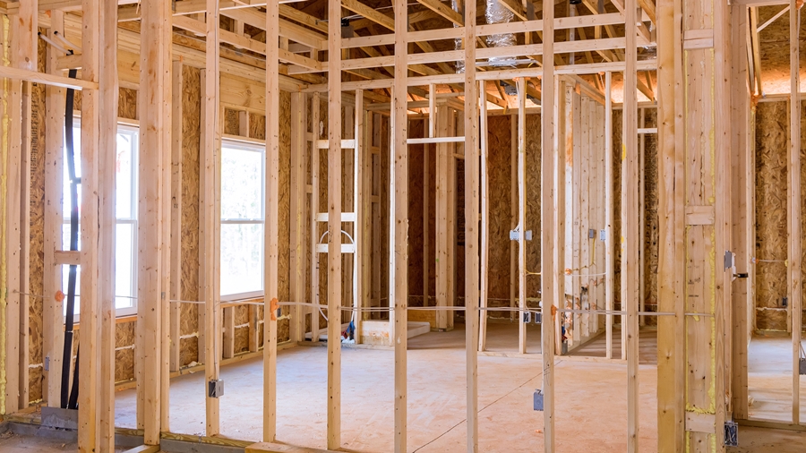 An interior timber frame construction, ready for drywall plasterboard installation.